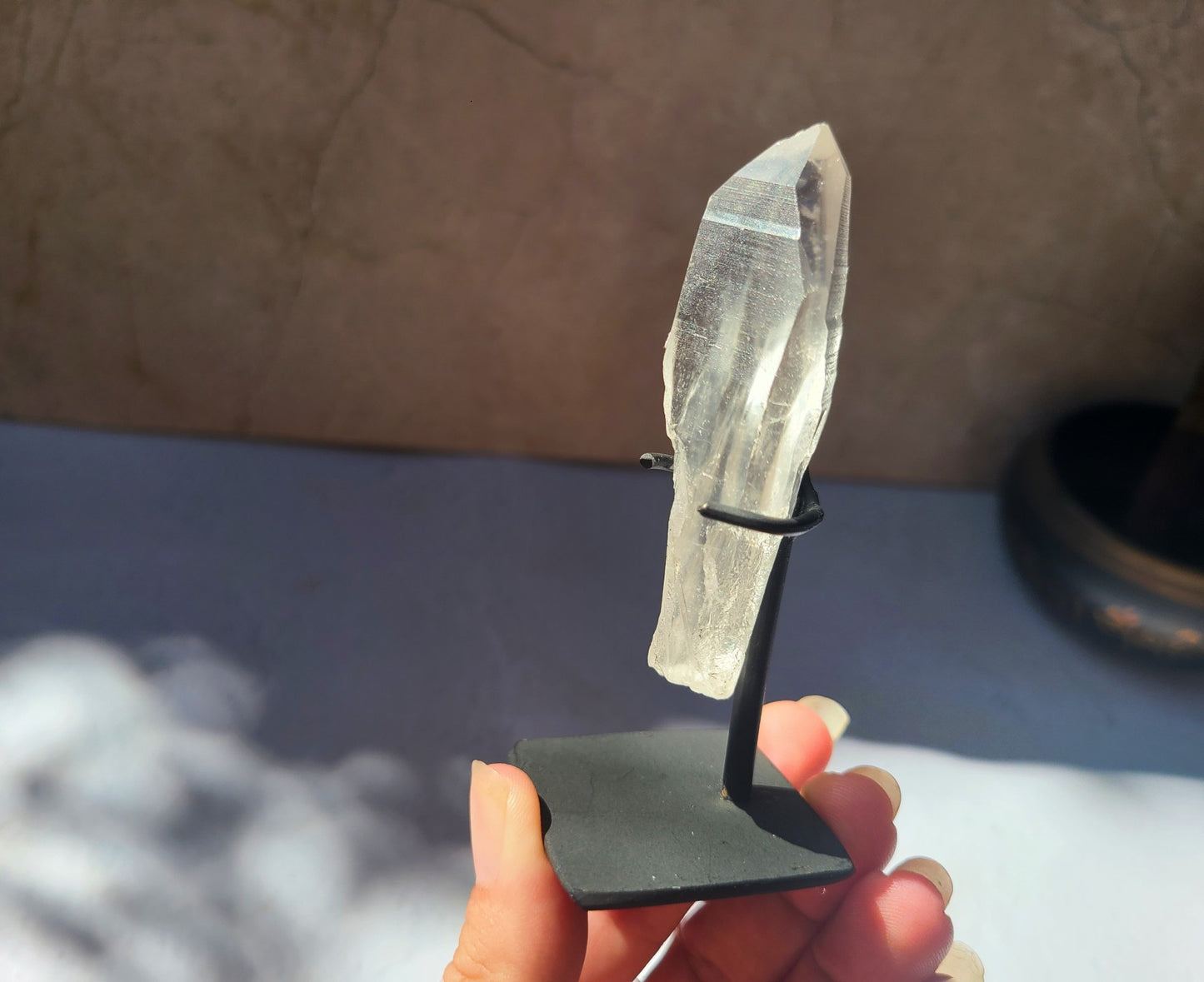 Lemurian Quartz Wand on metal stand 04