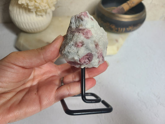 Raw Pink Tourmaline on stand