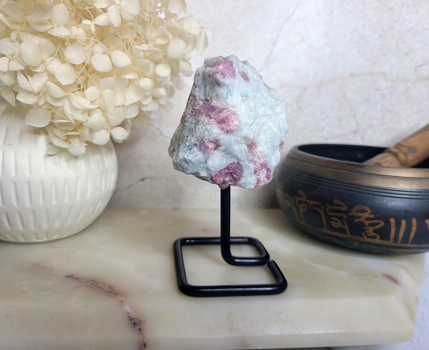 Raw Pink Tourmaline on stand