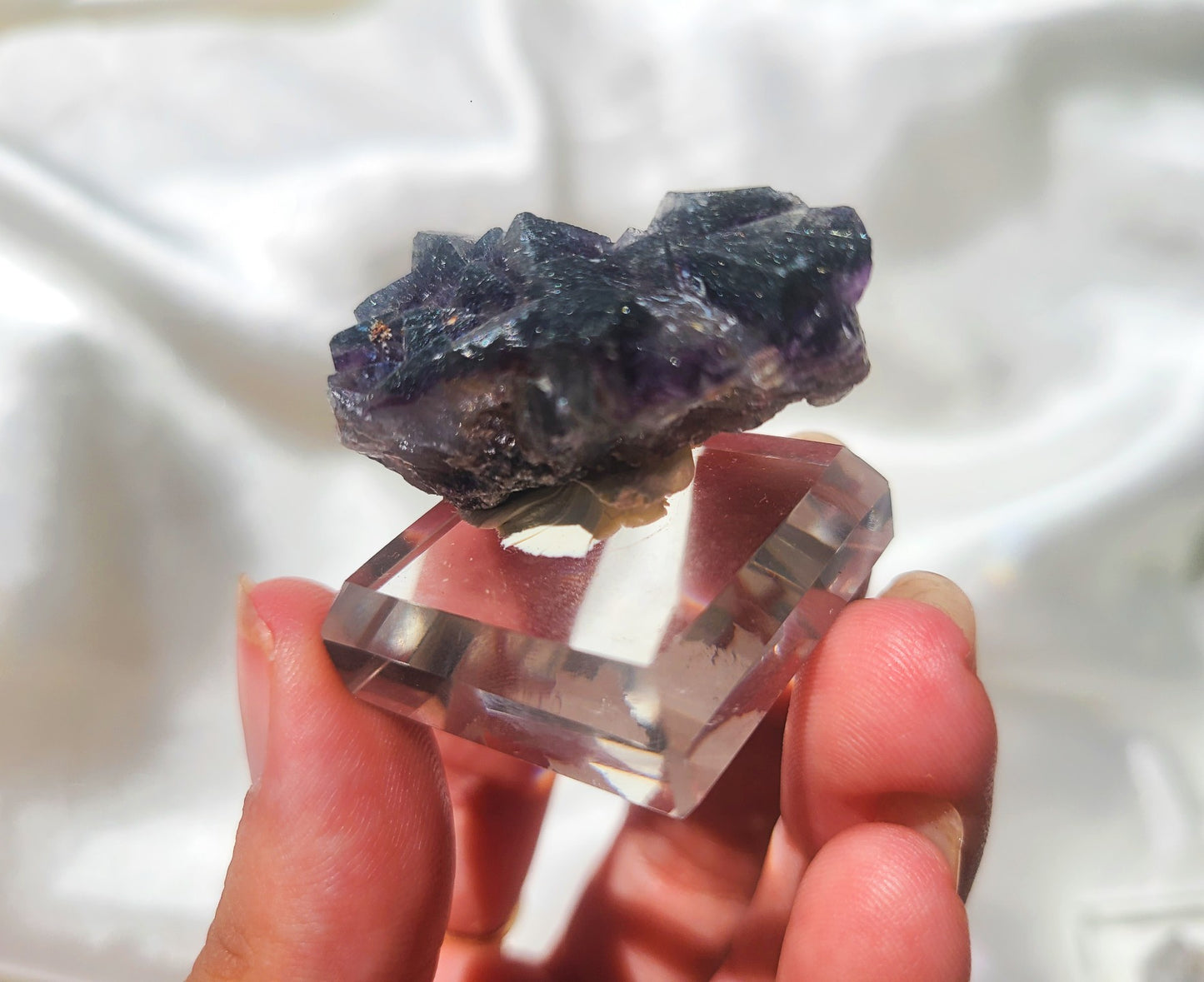 Rare Cubic Fluorite Specimen with Rutile inclusions on glass stand 02